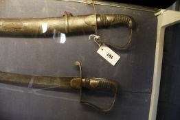 Two British 1796 pattern cavalry sabres, one with scabbard