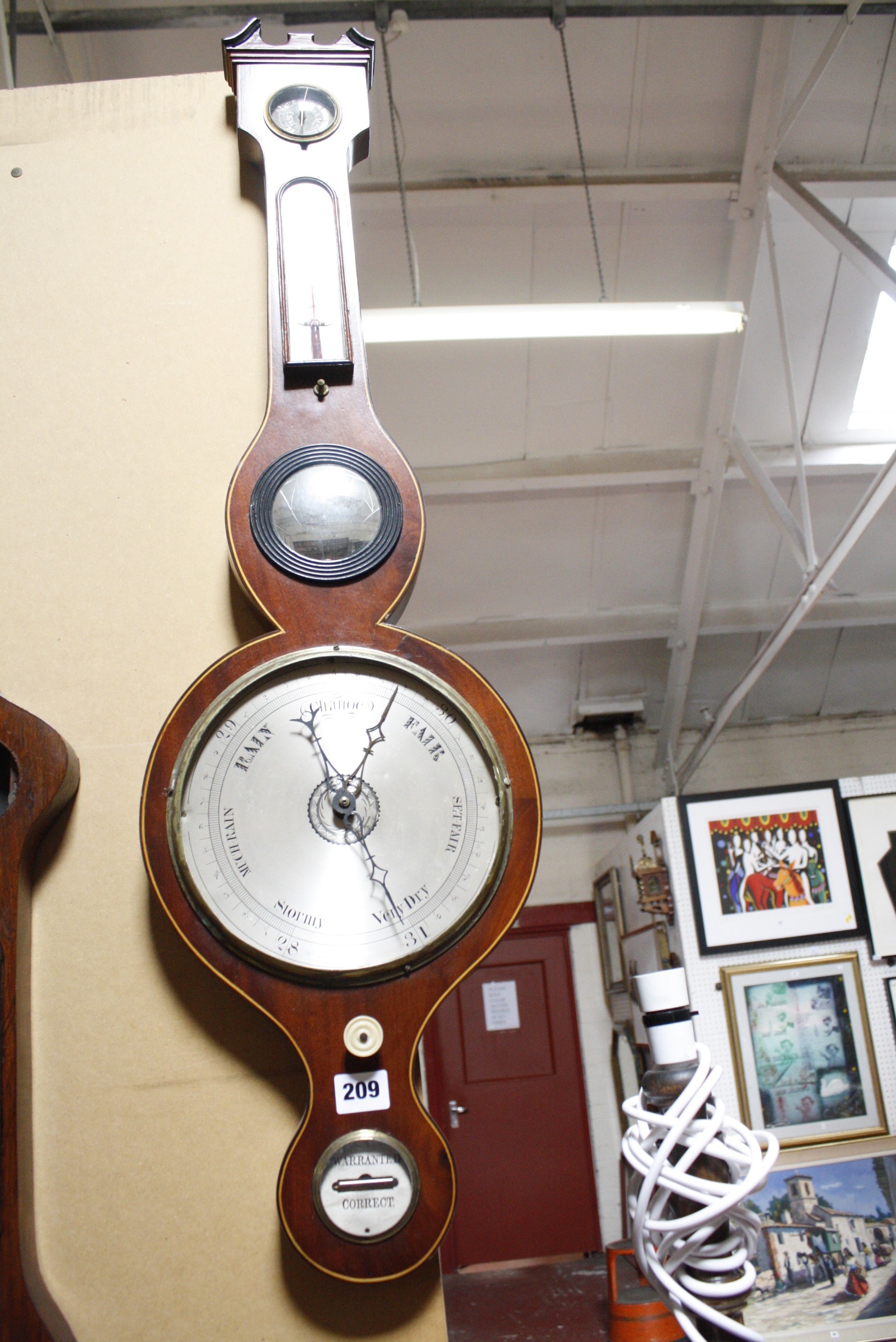 A 19th century mahogany wheel barometer, 94cm long (AF)