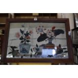 A 20th Century Chinese reverse painted mirror, 39cm x 59.5cm