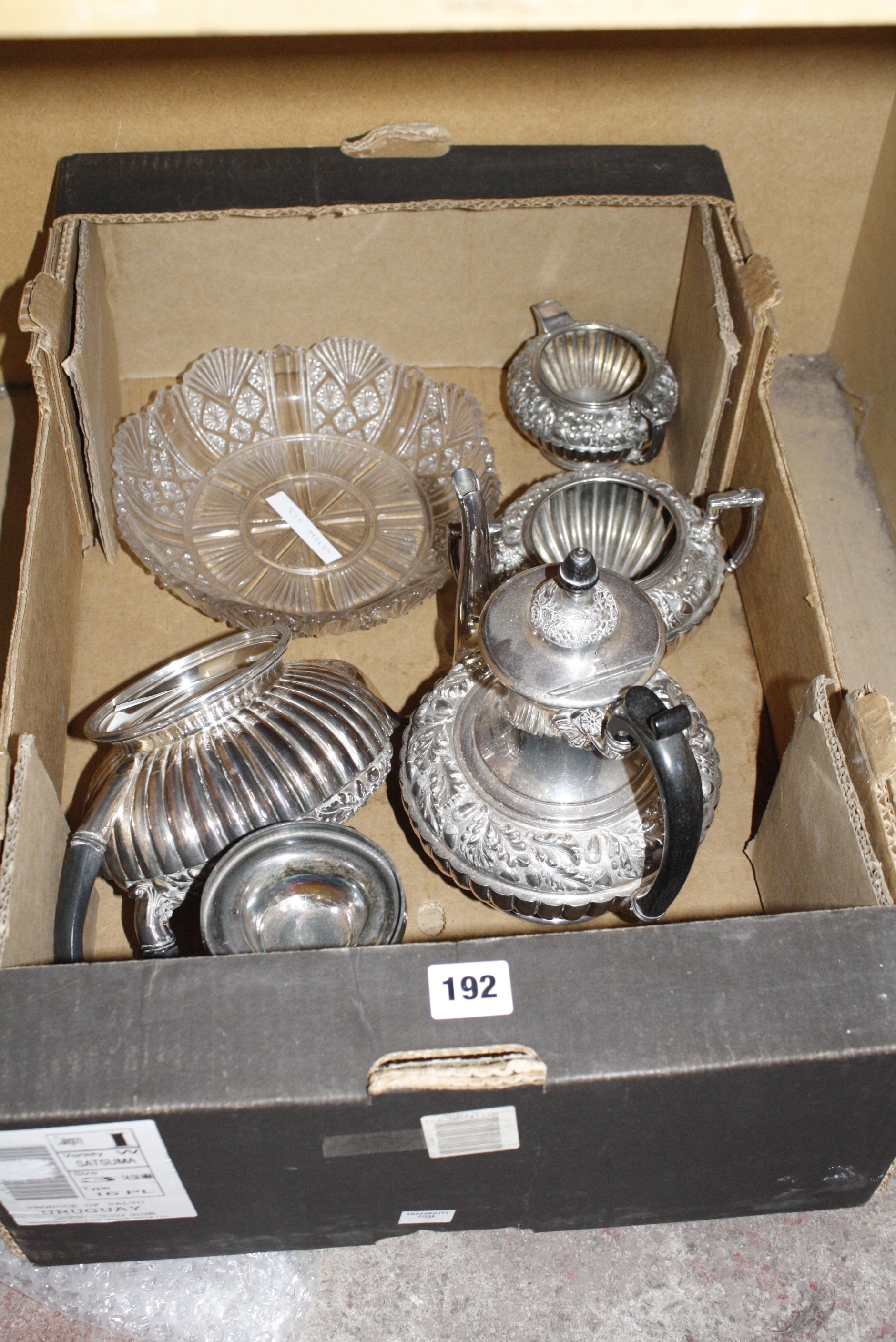 A late 19th century Continental metal and glass comport and a silver plated four-piece tea and