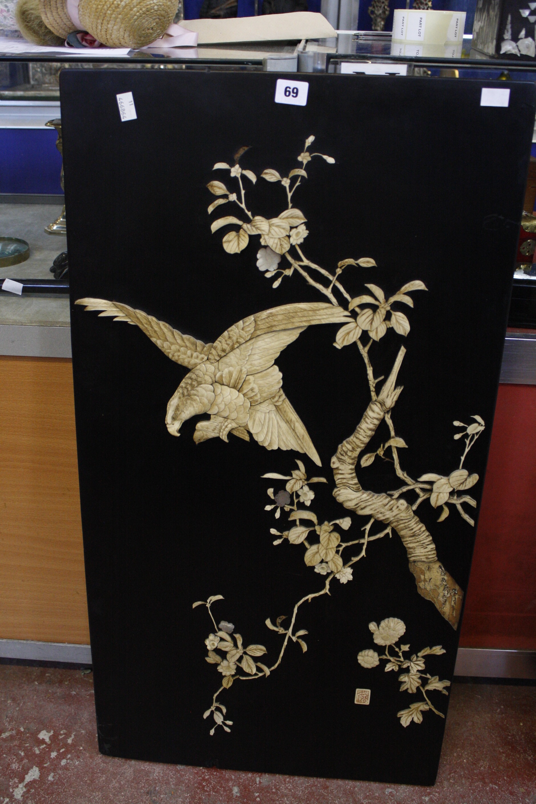 A pair of Japanese lacquer and bone relief carved panels (2)  Best Bid