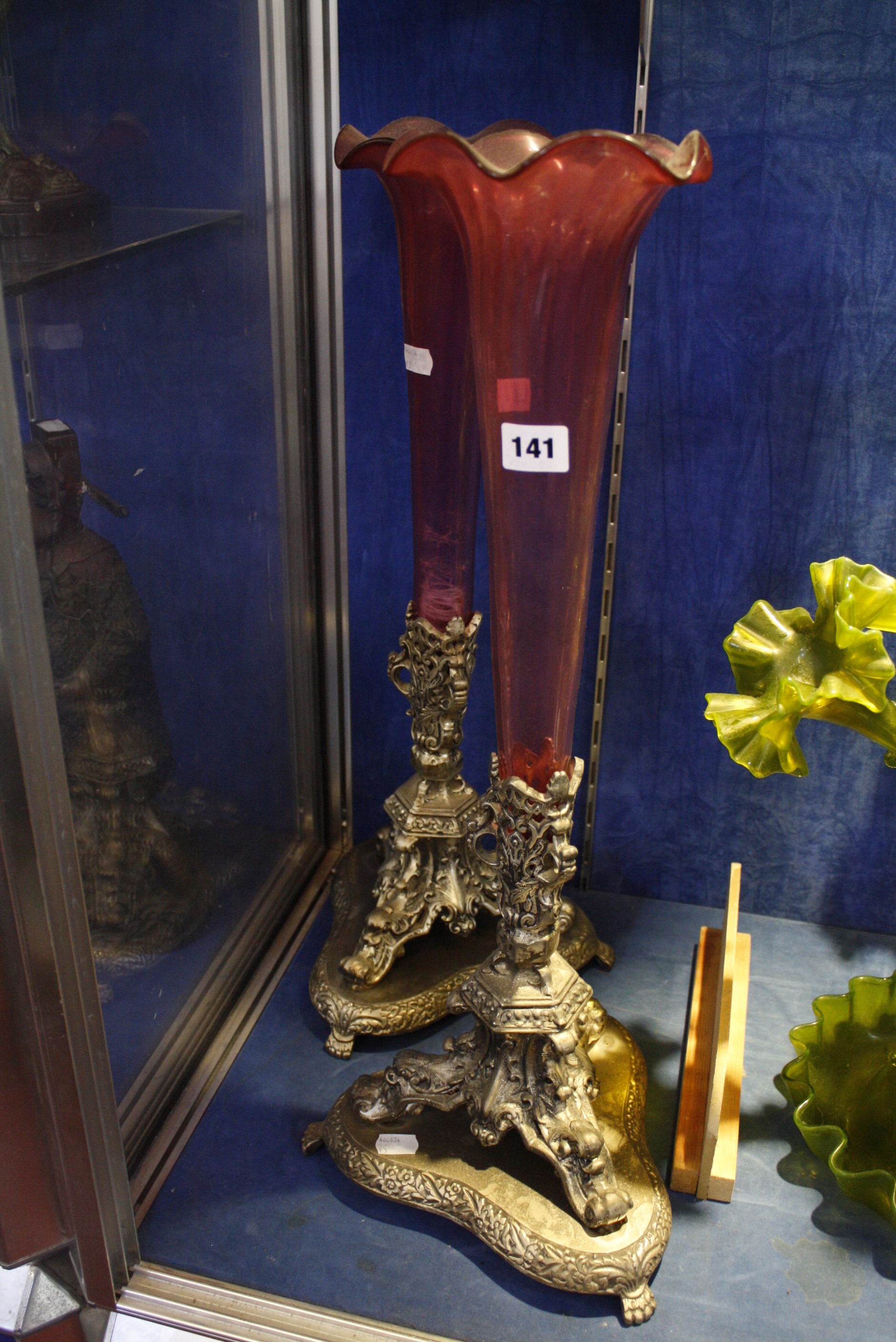 A pair of Victorian Style ruby glass trumpet vases with plated stands, 61cm high