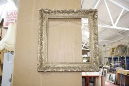 An empty gilt picture frame, 54cm x 54cm