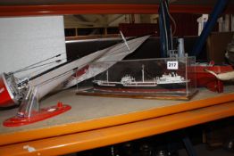 A Sealite radio sailing boat, a model Catamaran, a model boat and a model ship of the J. L. Hanna,