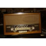 An EMUD German radio, ' Phono Rapid/63' circa 1950’s, with turn table, 55cm wide   Best Bid