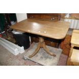 A Victorian mahogany tilt top occasional table on turned column and outswept legs 74cm high, 102cm