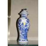 An 18th Century Chinese blue and white charger, 42cm in diameter (AF), a Chinese blue and white vase