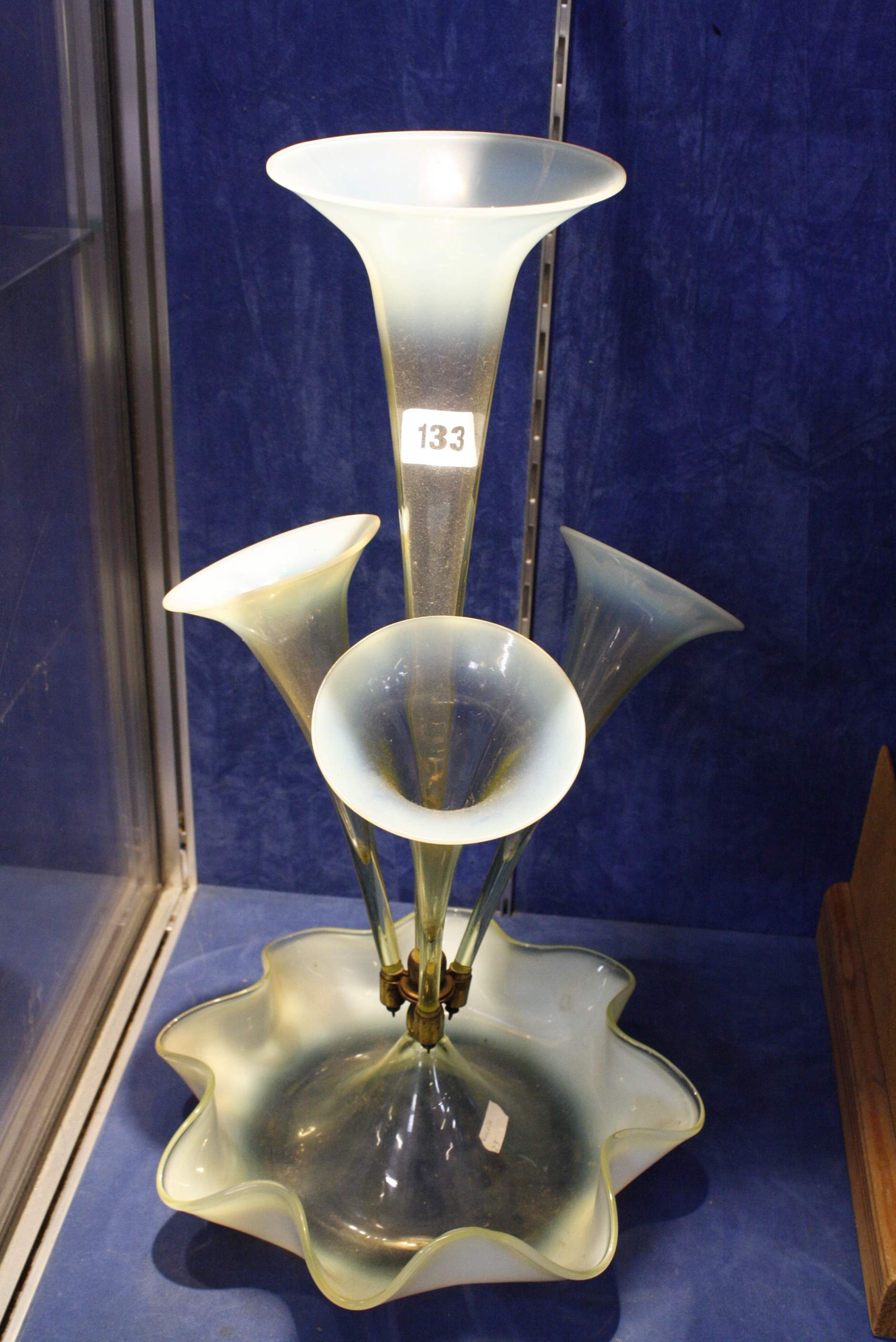 A Victorian green Vaseline glass four trumpet epergne, 51cm high