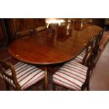 A reproduction D-end mahogany dining table 275cm extended