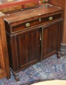 A Regency rosewood and brass inlaid side cabinet with a frieze drawer and cupboard below 89cm