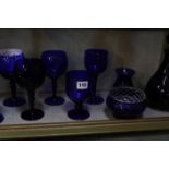 A quantity of English blue glass, to include decanters, wine glasses etc
