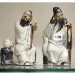 A pair of 20th Century Japanese pottery figures of wise men (AF), 19cm high approx. and another