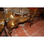 A Georgian style serpentine fronted mahogany dressing table 99cm wide