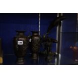 A pair of Oriental bronze vases, 23cm high, a composition Oriental figure, 18cm high and a