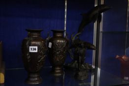 A pair of Oriental bronze vases, 23cm high, a composition Oriental figure, 18cm high and a