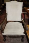An Italian carved stained beech high back armchair