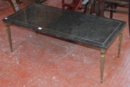 A brass and mottled black marble mounted coffee table 42cm high, 113cm wide plus a William IV