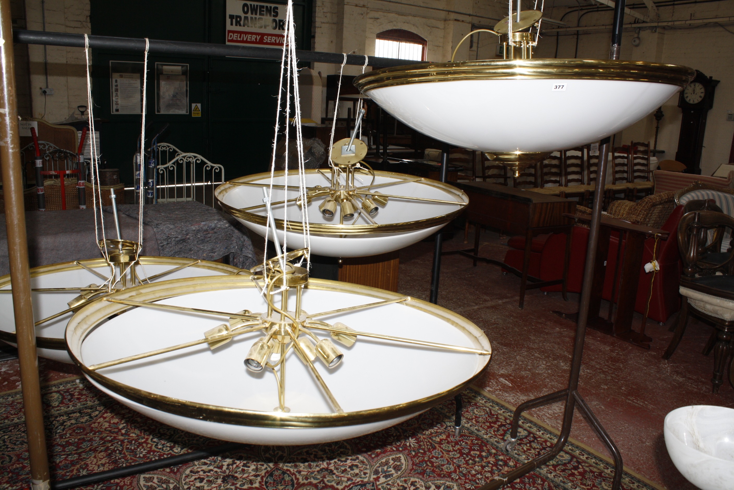 Eight domed brass and opaline shade ceiling lights, 94cm diam. Sold as parts.