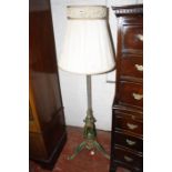 A Victorian gilt metal and painted standard lamp and shade.(sold as parts)