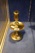 An early Dutch Heemskerk brass candlestick, 22cm