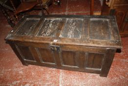 A 17th Century panelled oak coffer 123cm length