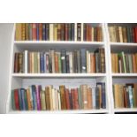 Twelve shelves of hard back books to include Complete Works of Shakespeare, two vols Imperial Ed.