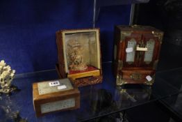 A quantity of Oriental items including a carved soapstone floral group on stand, other soapstone