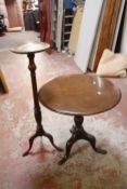 An 18th Century and later mahogany tripod table 71cm high, 67cm diameter and a mahogany torchere