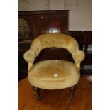 A Victorian upholstered tub chair