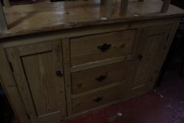 A 19th Century pine sideboard.145cm wide x 45cm deep x 93cm high.