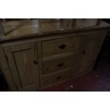 A 19th Century pine sideboard.145cm wide x 45cm deep x 93cm high.