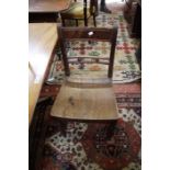 A set of six 19th Century country Sheraton design dining chairs with wooden panelled seats