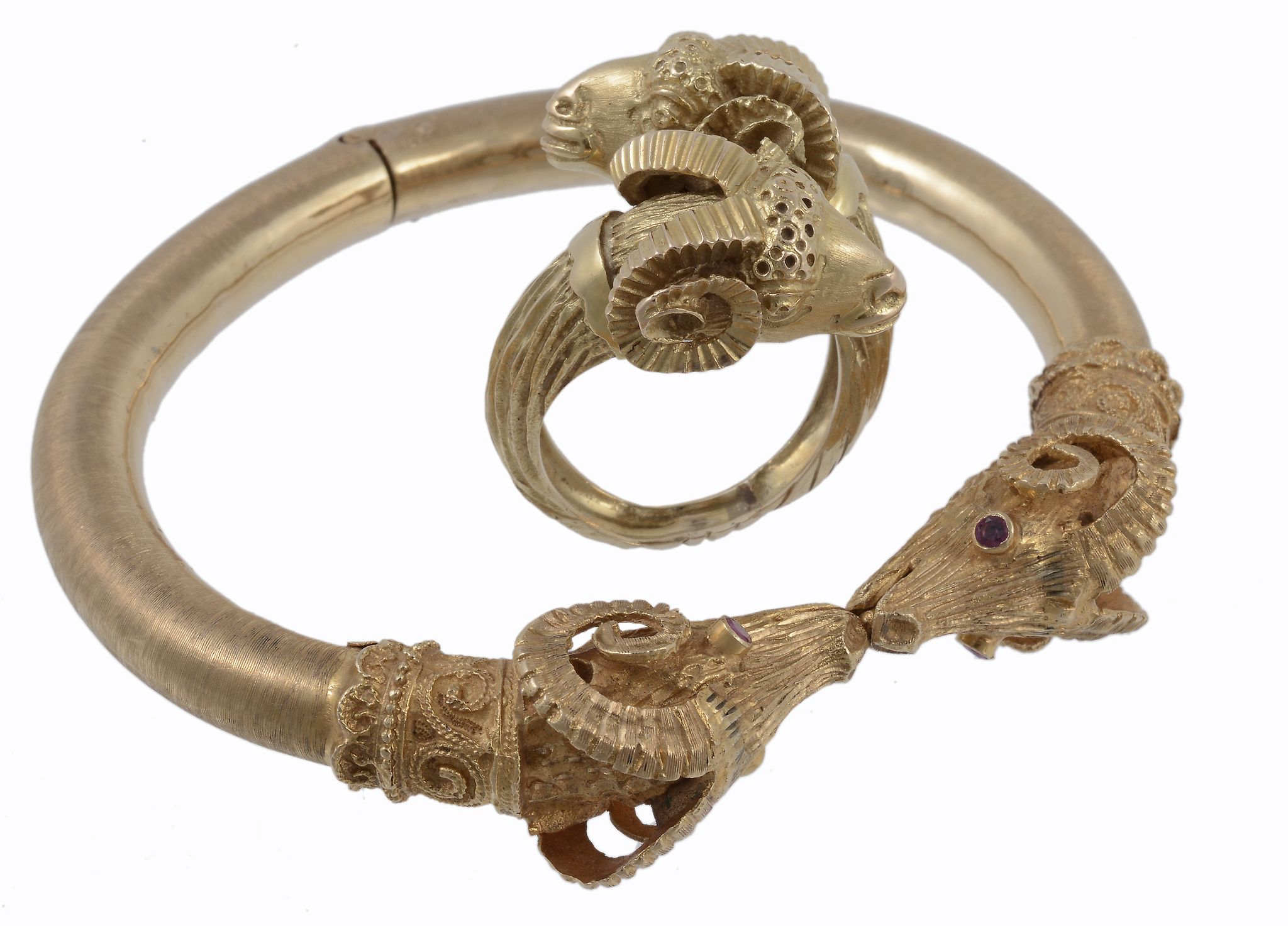 A ram's head bangle, the hinged bangle with ram's head terminals  A ram's head bangle,   the