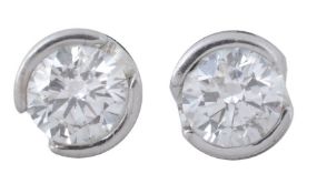 A pair of diamond ear studs , the brilliant cut diamonds approximately 0  A pair of diamond ear
