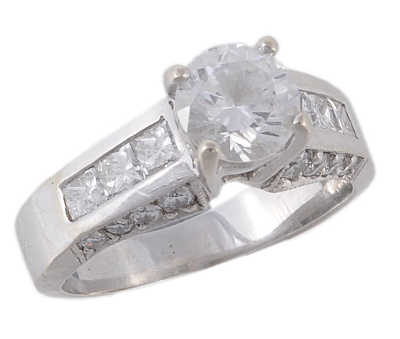 A single stone diamond ring , the brilliant cut diamond claw set above...  A single stone diamond