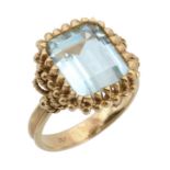 An aquamarine ring, the rectangular shaped aquamarine claw set within a...  An aquamarine ring,