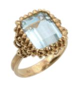 An aquamarine ring, the rectangular shaped aquamarine claw set within a...  An aquamarine ring,
