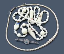 A cultured pearl necklace with diamond set clasp , circa 1920  A cultured pearl necklace with