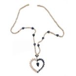 A sapphire and diamond pendant necklace, the heart shaped pendant set with...  A sapphire and