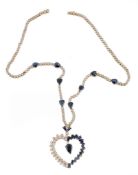 A sapphire and diamond pendant necklace, the heart shaped pendant set with...  A sapphire and