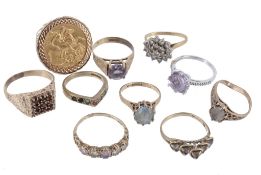 A sovereign set ring, in a 9 carat gold setting; together with various...  A sovereign set ring,