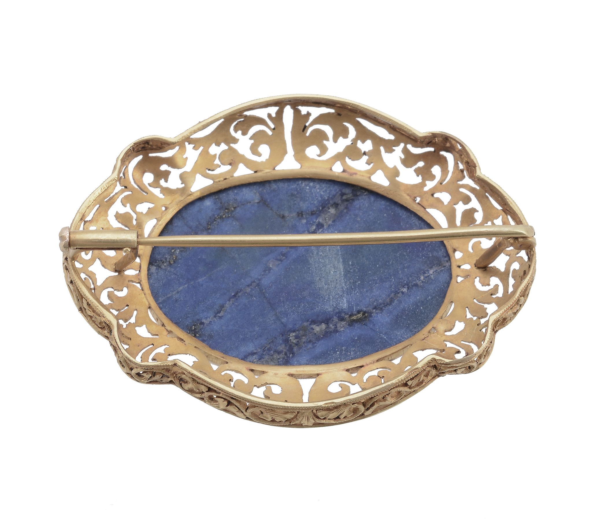 A lapis lazuli brooch, the central oval cabochon lapis lazuli within a...  A lapis lazuli - Image 2 of 2