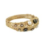 A diamond and cultured pearl flower hinged bangle  A diamond and cultured pearl flower hinged