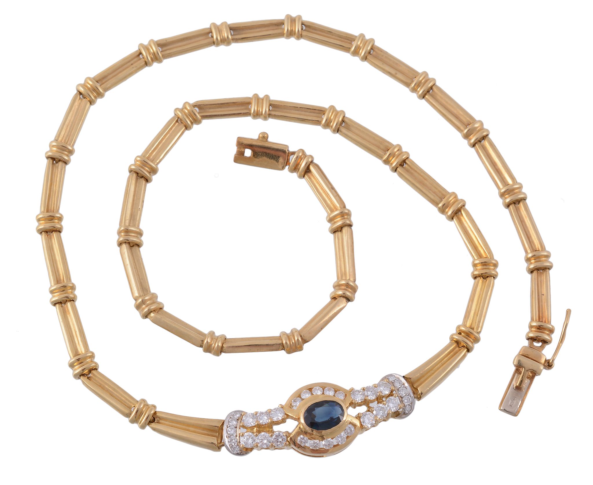 A sapphire and diamond necklace, composed of articulated polished reeded links  A sapphire and