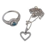 A diamond and colour treated blue diamond cluster ring  A diamond and colour treated blue diamond