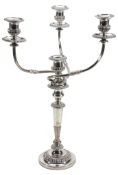 An old Sheffield plated four light candelabra by Matthew Boulton & Co  An old Sheffield plated