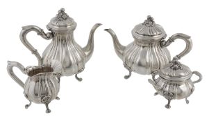 An Italian silver coloured fluted baluster four piece tea and coffee service  An Italian silver