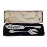 A cased pair of Victorian silver Crecian pattern fish servers by Chawner & Co  A cased pair of