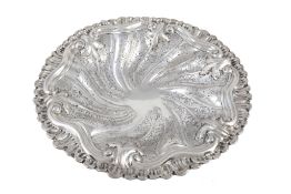 An Italian silver coloured wrythen lobed dish, 1872-1933  An Italian silver coloured wrythen lobed