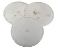 A set of twelve silver covered circular place mats by Tessiers Ltd, London 1969  A set of twelve